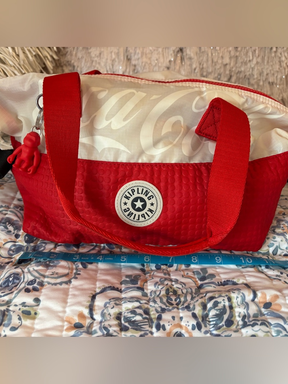 Kipling Red Coca Cola limited run 
Quilted Tote with White Logo Patch